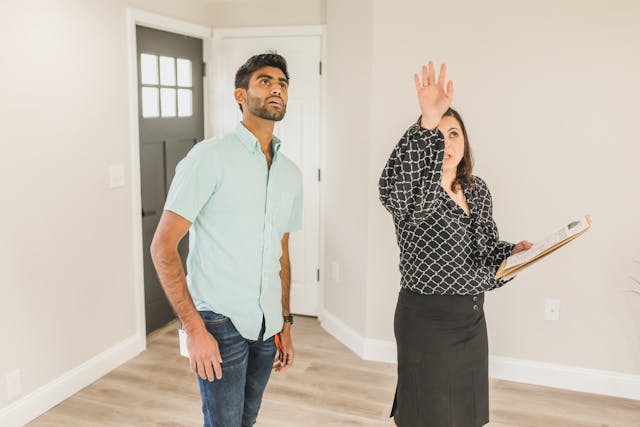 a real estate agent conducting a property showing with a potential investor